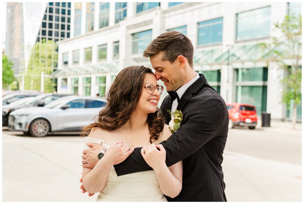 Charlie & Brittany - Regina Wedding - 20- Couple downtown Regina