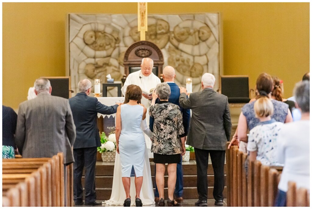 Remi & Celine - Regina Wedding - Holy Rosary Cathedral - 06- Family blessing over the couple