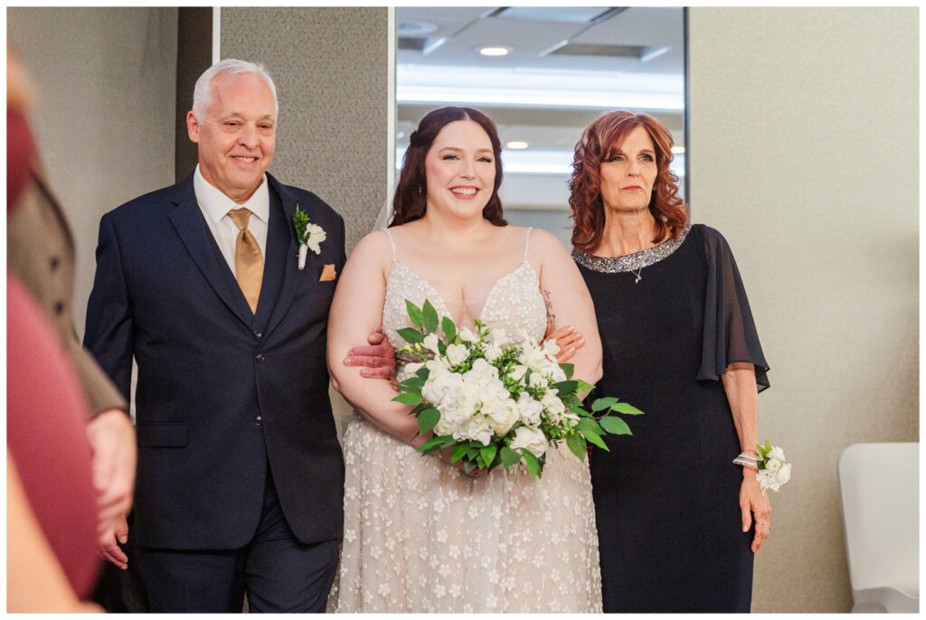 Darren & Amber - Regina Wedding - Summer Wedding 2024 - 12 - The Atlas Hotel - Bride enters with her parents