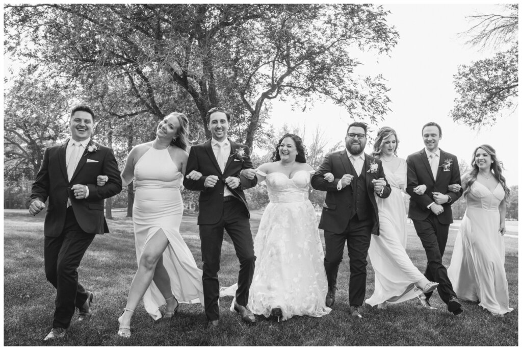 Dustin & Kristyn - Regina Wedding - 14 - University of Regina - Bridal party is off to see the wizard