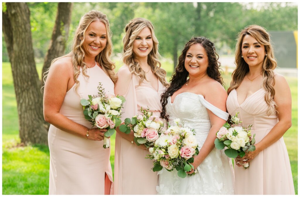 Dustin & Kristyn - Regina Wedding - 15 - University of Regina - Bridesmaids in blush pink dresses