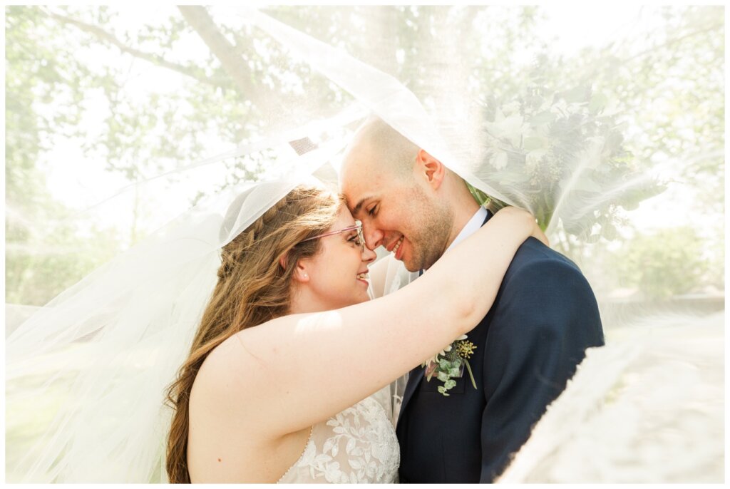 Evan & Melissa - Regina Wedding - Parkridge Park - 12 - Under the veil with bride & groom