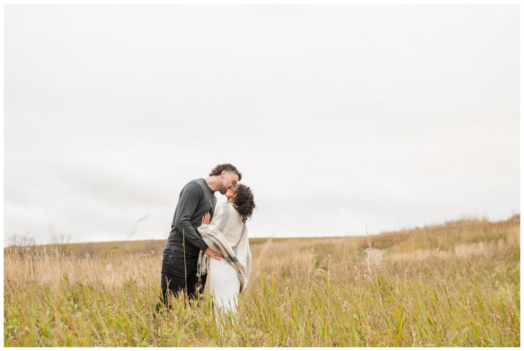 Blayde & Hanna - Regina Engagement Session - 06 - Wascana Trails - Couple stops for a kiss