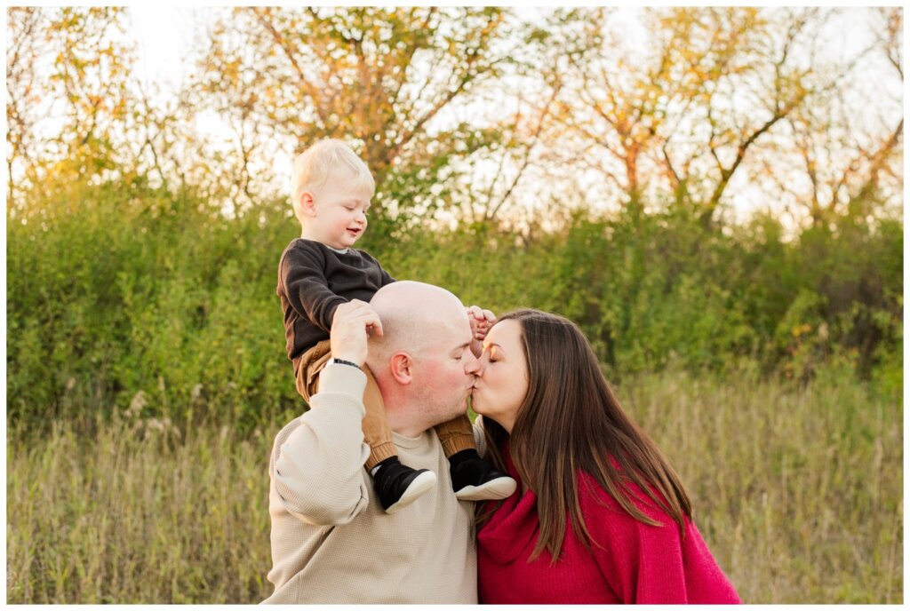 Munroe Family 2024 - Wascana Habitat Conservation Area -09 - Mom & dad pause for a kiss