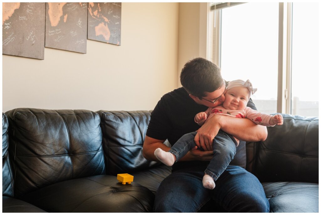 Ben & Megan - In home family session - Regina Family Photography - 03 - Dad gives daughter kisses