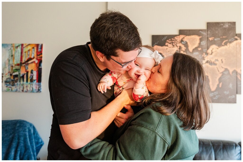 Ben & Megan - In home family session - Regina Family Photography - 06 - Mom & Dad give smushy kisses