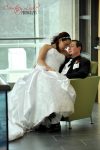 Ashlee & Matt - Cuddling in a chair - Regina Wedding Photography