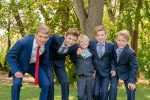 Boy cousins dressed in suits