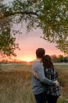 Couple overlooking the Saskatchewan sunset
