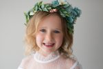 Little girl in green floral crown