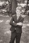 Tween poses for photo in his suit in Regina