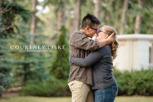 Couple embrace during their Regina engagement session with Courtney Liske Photography