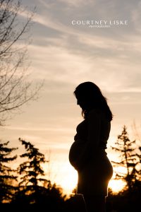 Maternity session sunset silhouette