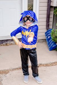 Girl dressed as Batgirl for Halloween