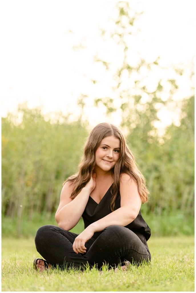 Regina Family Photographer - Georgia Graduation 2020 - Summer Graduation Session - Girl sitting in park in casual outfit