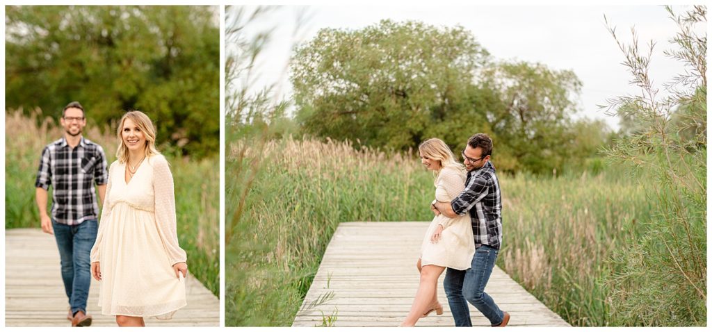 Regina Engagement Photography of Brett & Rachelle's Natural Light Engagement Session in Douglas Park in Regina. Man scoops up his bride-to-be on a dock in the Wascana Habitat Conservation Area