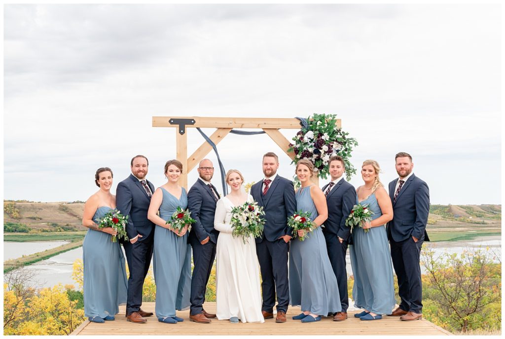 Regina Wedding Photography - Tyrel - Allison - Bride & Groom with bridal party - Groom in Navy Blue suit - Bridesmaids in periwinkle blue