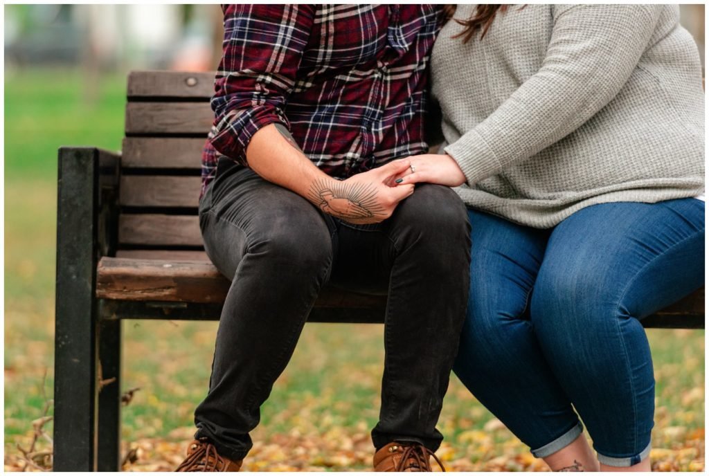 Regina-Engagement-Photographer-Kolton-Maxine-009-Victoria-park-engagement-sitting-on-bench