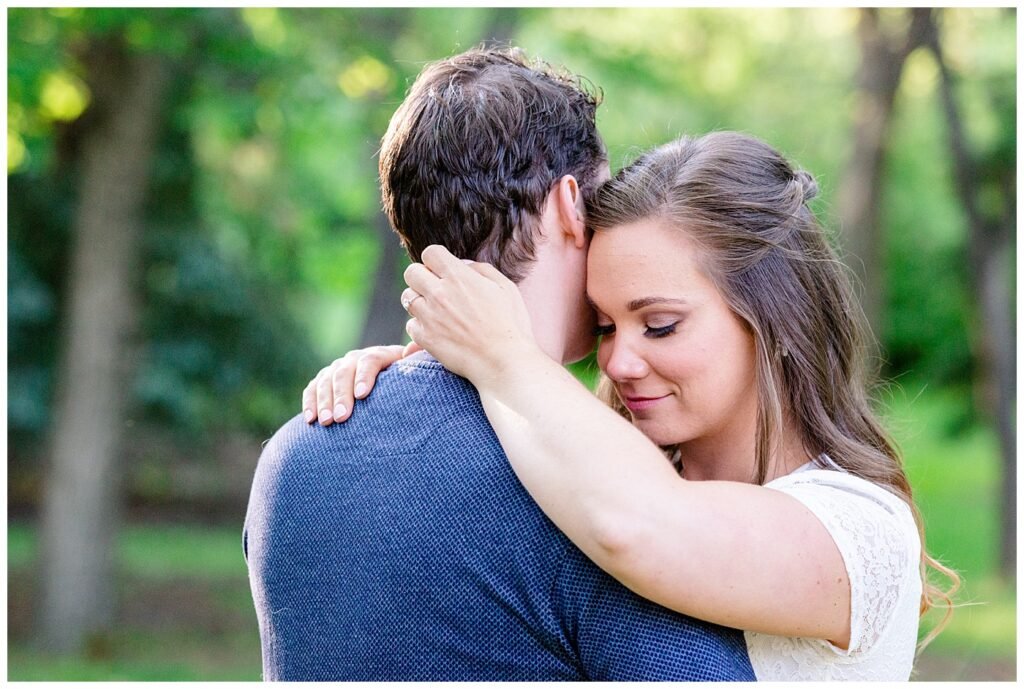 Regina Engagement Photography - Adam - Sarah - Natural Light Engagement Session in Wascana Park - Couple take a quiet moment in the park.jpg