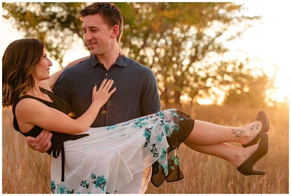 Regina-Engagement-Photography-Taylor-Jolene-006-White-City-Engagement-Session-Carrying-fiancee