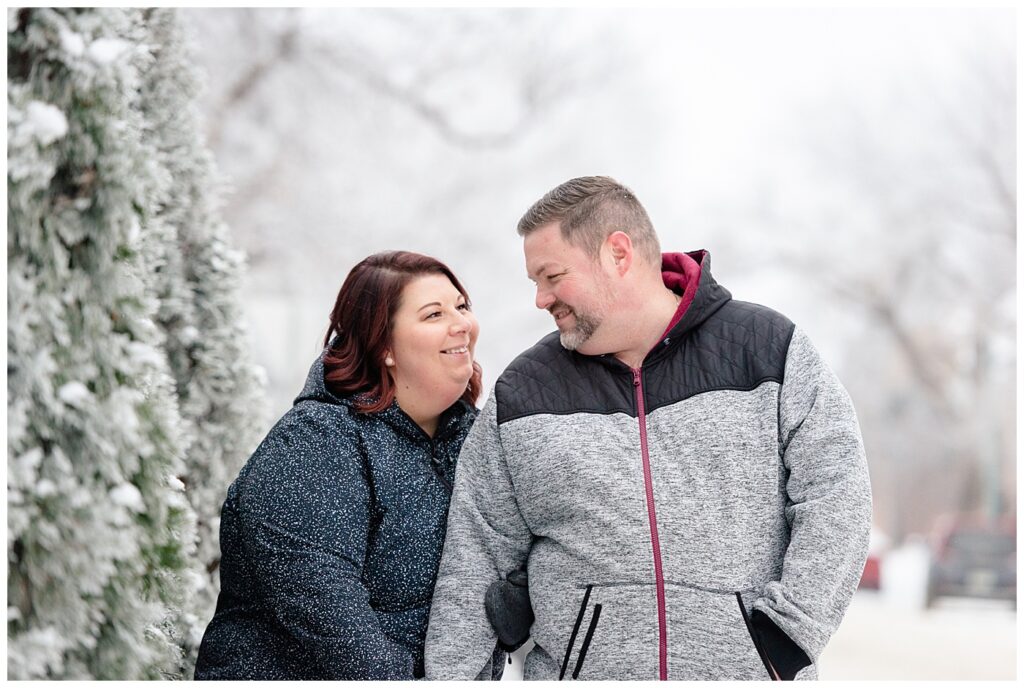 Regina Wedding Photographer - Ashley - Scott - Couple standing in front of frosted evergreen trees