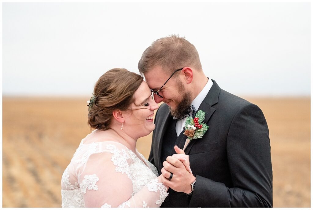 Regina Wedding Photography - Kolton - Maxine - Bride & Groom pull in close for their first dance