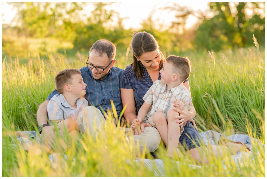 Brent & Courtney -10 - Family sitting on blanket in grass