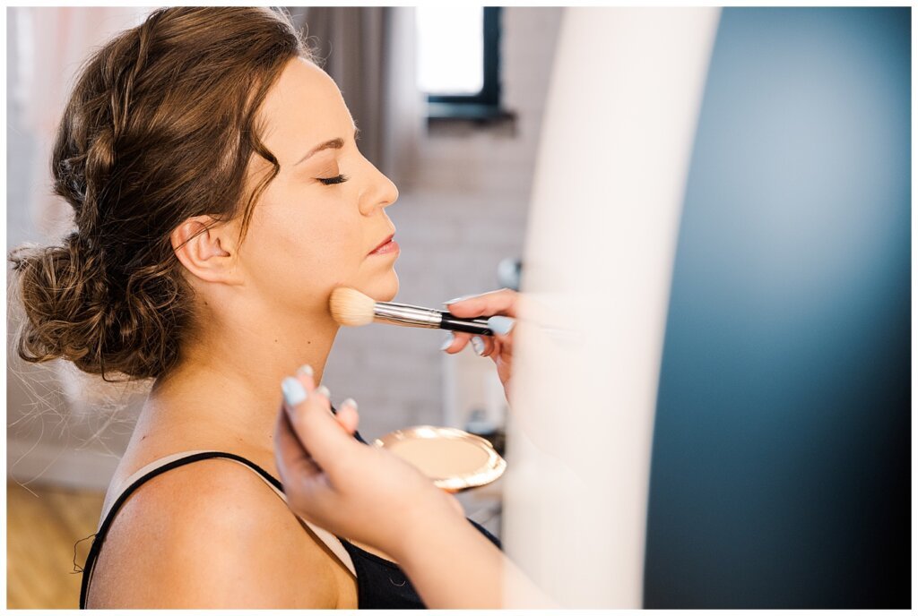 Bride Jillyan's make up finishing touches at The Beauty Loft