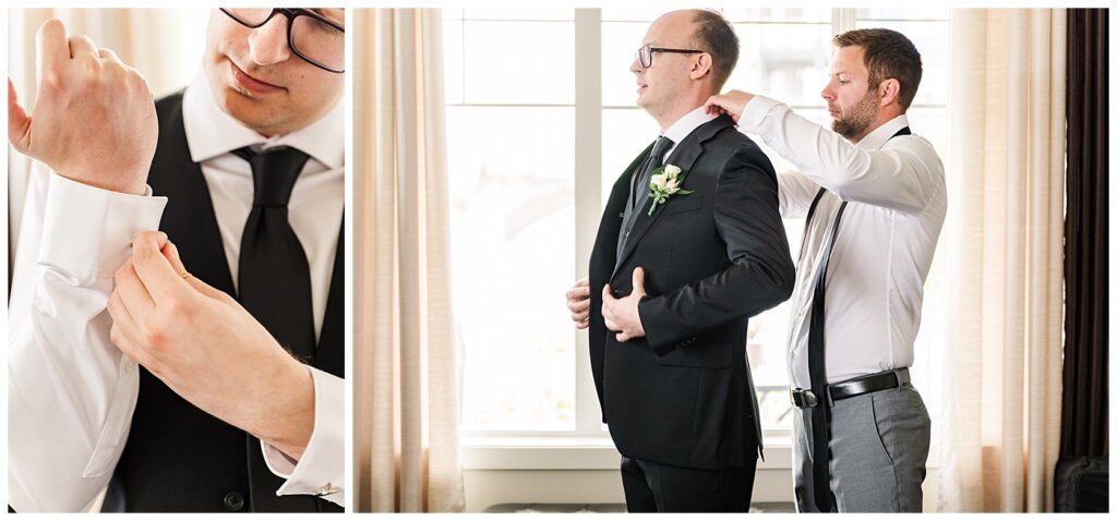 Groom buttoning up cufflinks and finishing details with best man