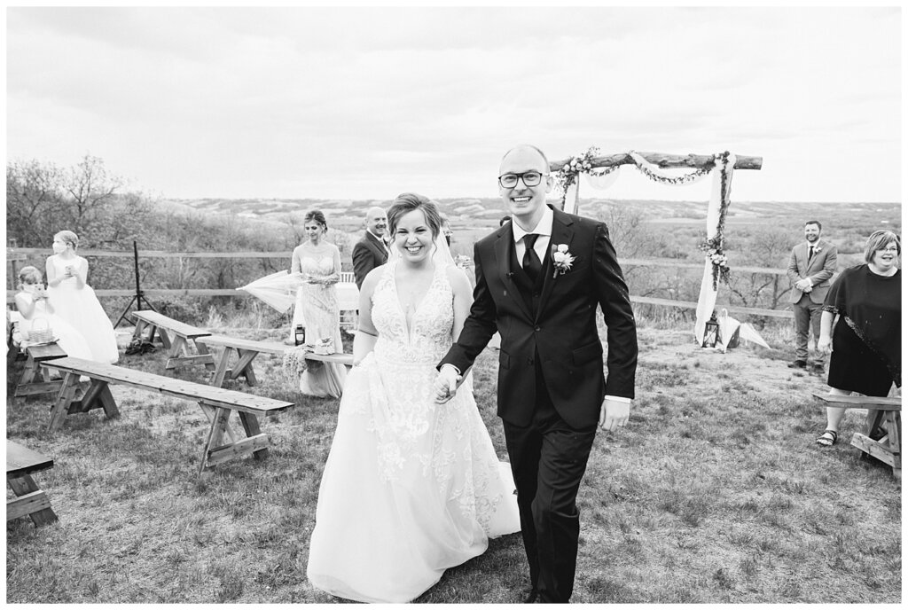 Colter & Jillyan's recessional from wedding ceremony at top of Lumsden hill