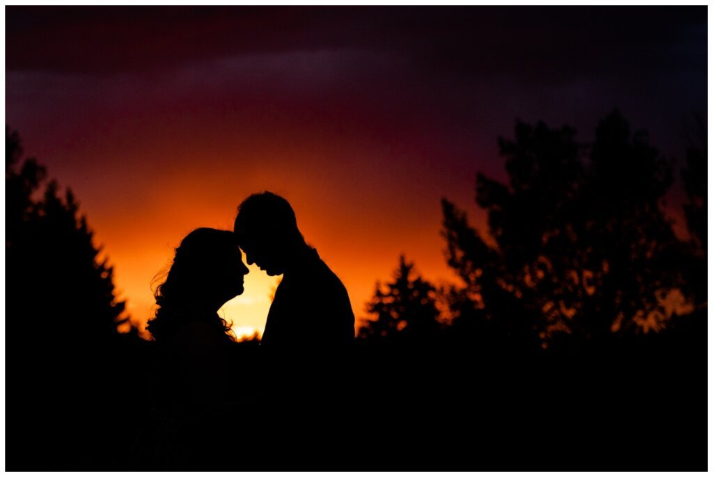 Sheldon & Amy - Engagement Session - 012 - Sunset silhouette of couple