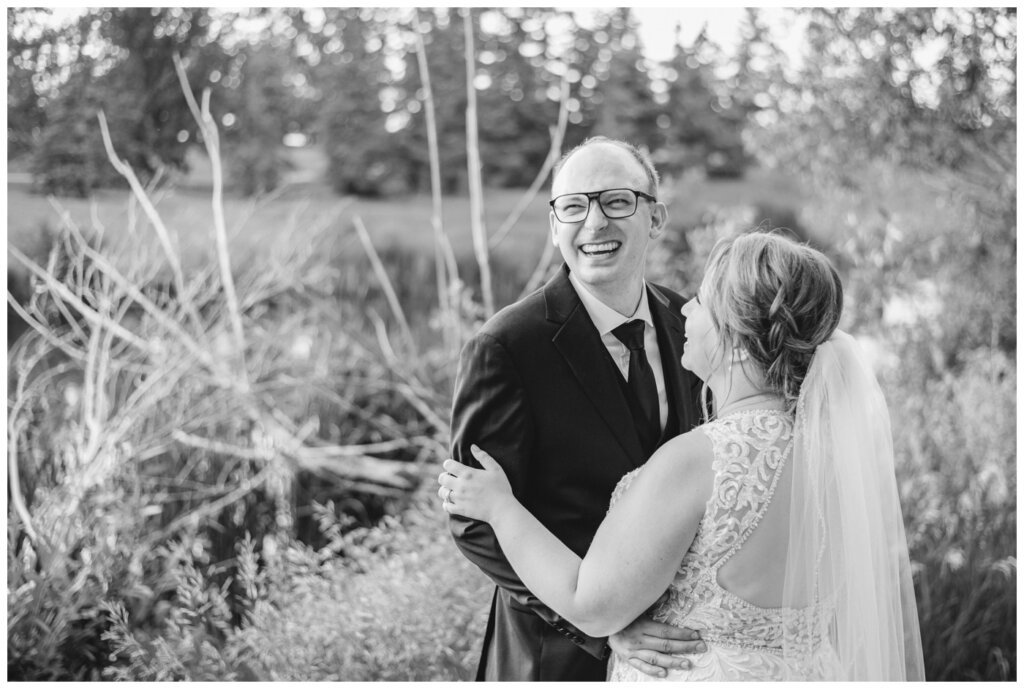 Colter & Jillyan - Encore Wedding Session - 06 - Groom laughing off camera