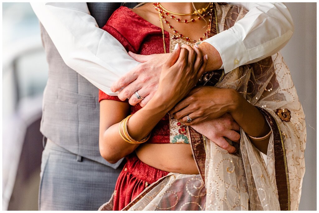 Stephen & Sarah Wedding - 26 - Close up of Bride's rings, bangals, and Langa