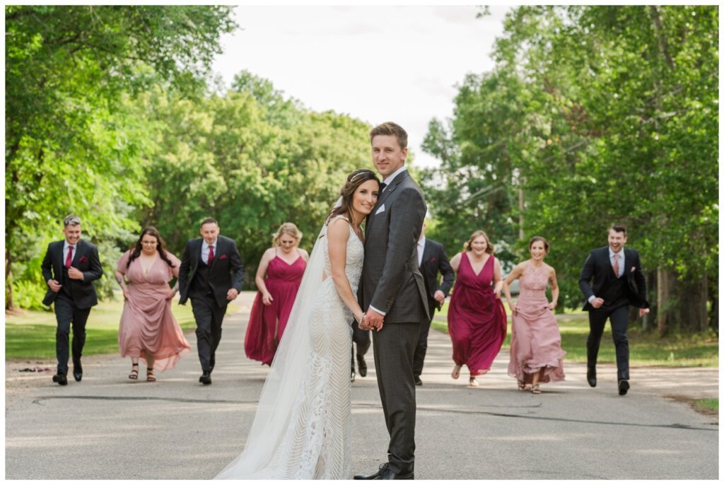 Taylor & Jolene - Emerald Park Wedding - 23 - Bride & Groom get a surprise from the bridal party