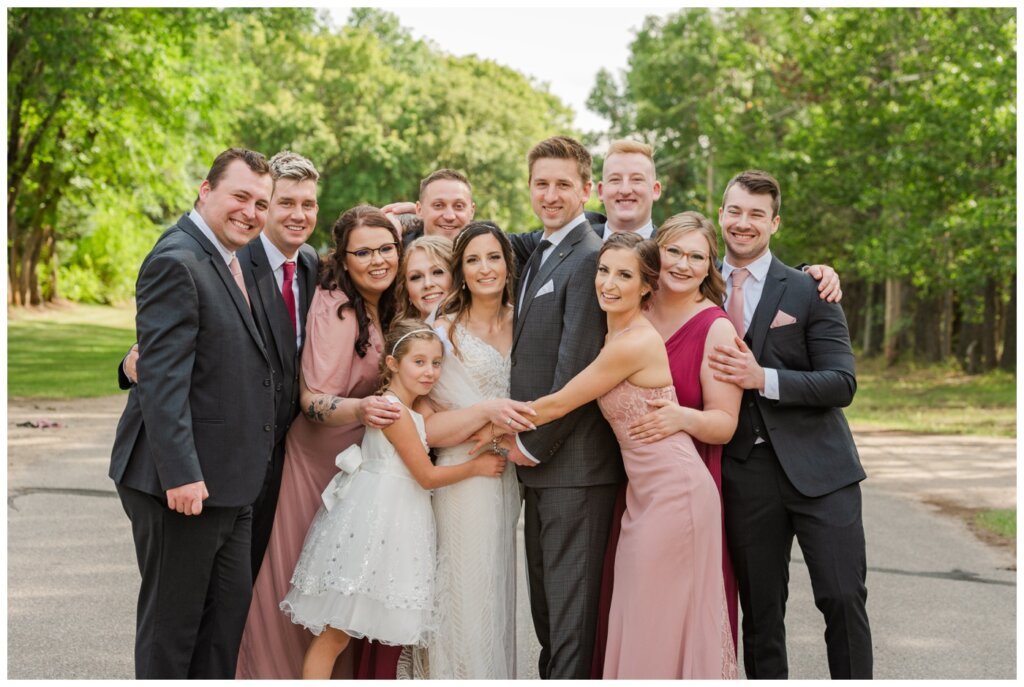 Taylor & Jolene - White City Wedding - 25 - Bridal party group hug