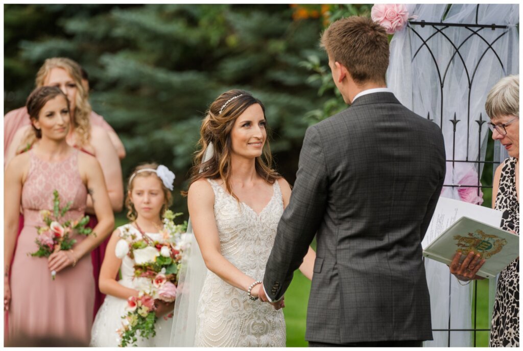 Taylor & Jolene - White City Wedding - 32 - Bride & Groom exchange vows