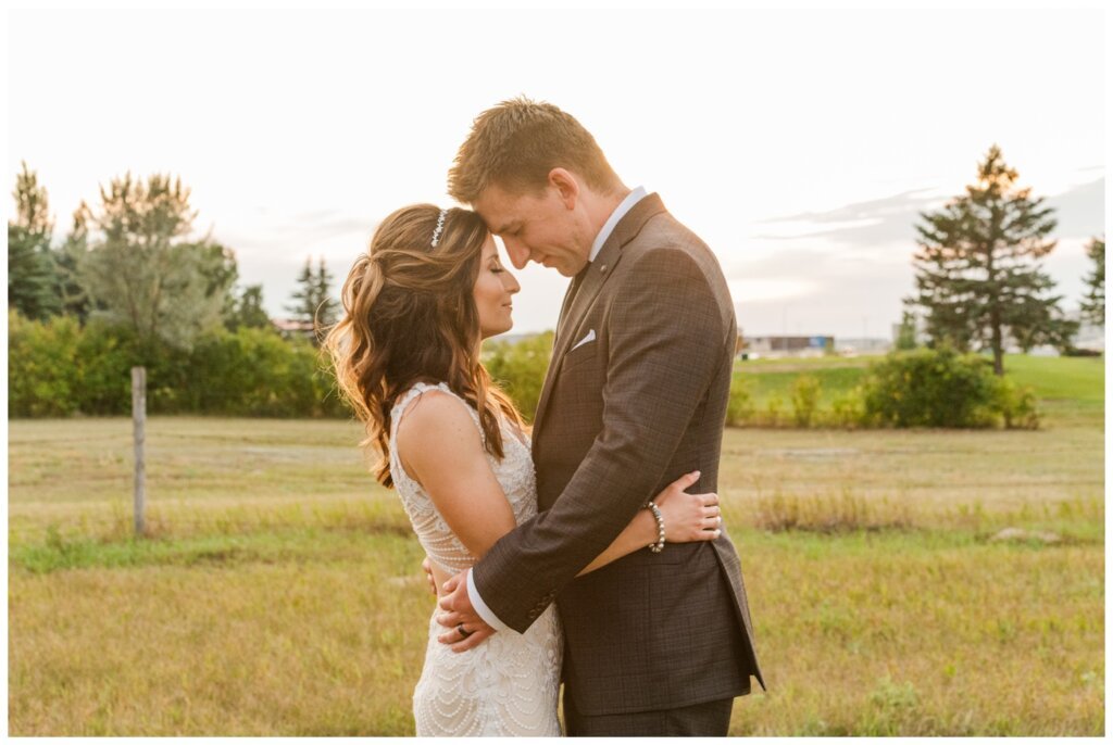 Taylor & Jolene - White City Wedding - 40 - Bride & Groom take a breath at sunset