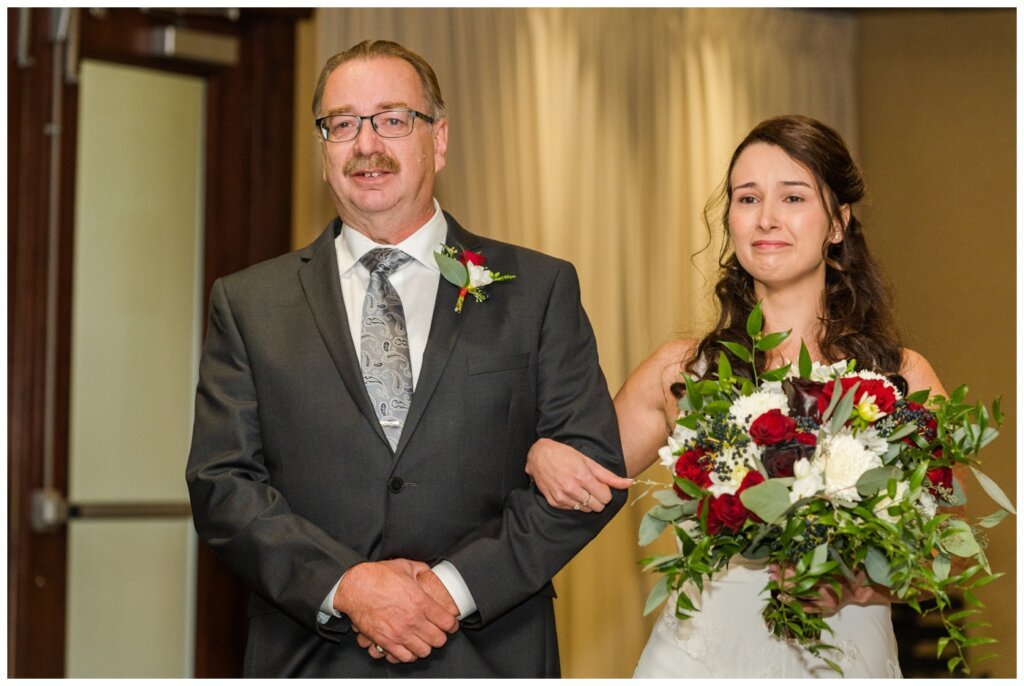 Andrew & Lacey - 13 - Sandman Hotel - Bride proceeding down aisle towards groom