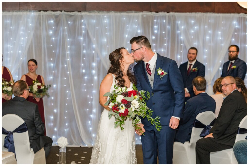 Andrew & Lacey - 16 - Bride & Groom Recessional Kiss