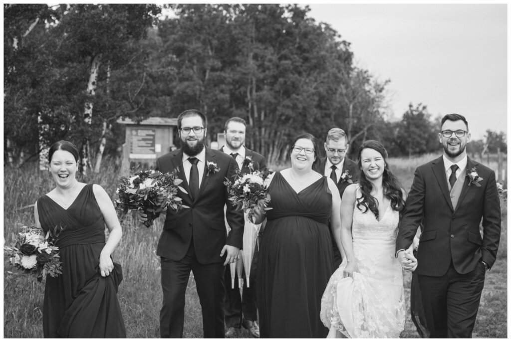 Andrew & Lacey - 32 - Wedding Party walking at White Butte Trails