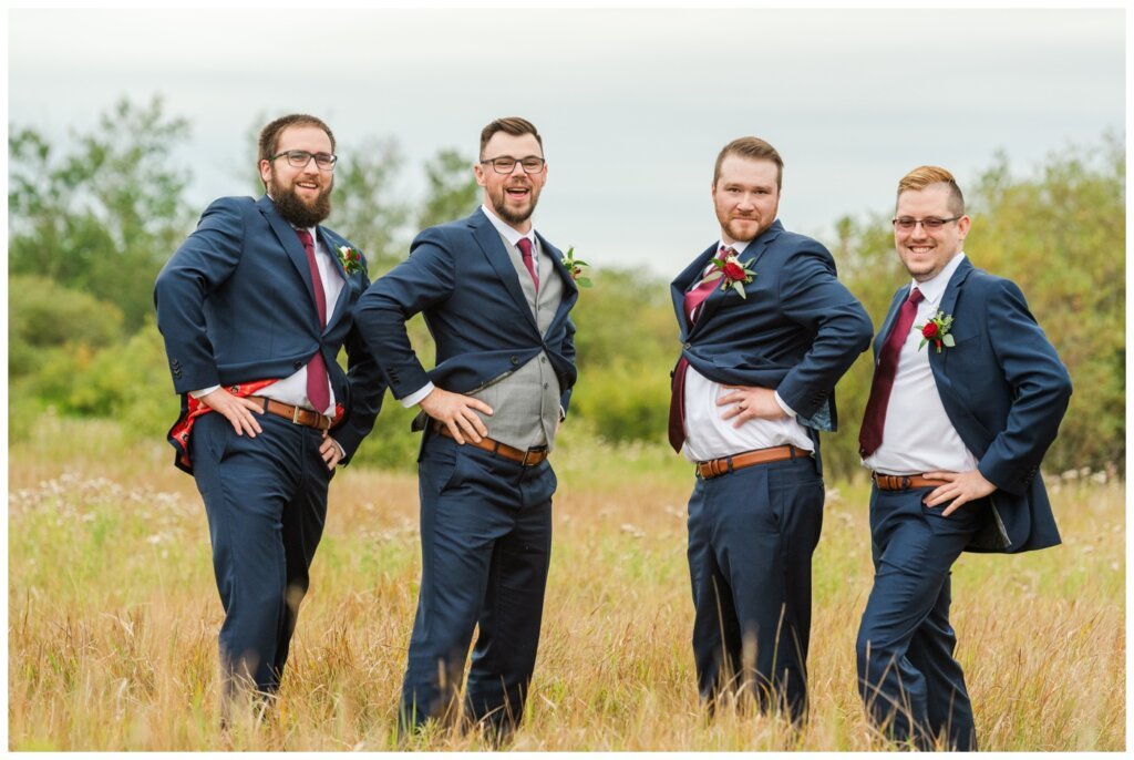 Andrew & Lacey - 35 - Groom and Groomsmen showing off their sass