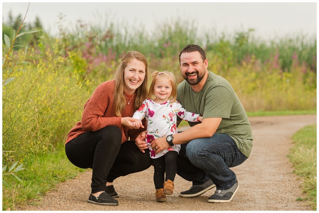 Eyre Family 2021 - AE Wilson Park - Family Photo Shoot - 13 - Family crouches together on the walking path