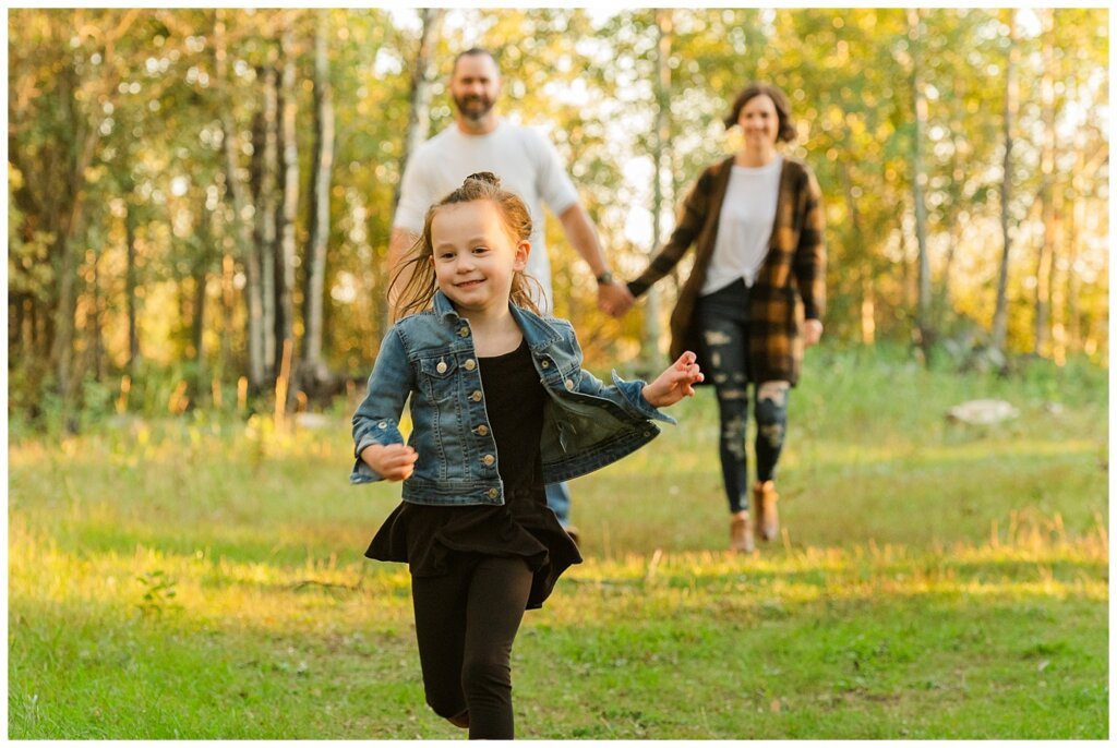 Kim & Lisa Korchinski - White Butte Trails - Family Photo Session 2021 - 03 - Daughter running in front of parents walking