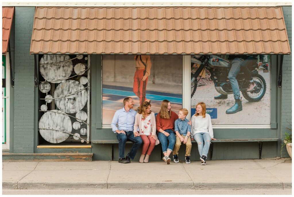 Schoenroth Family - Cathedral Village Regina - 11 - Family sits on bench