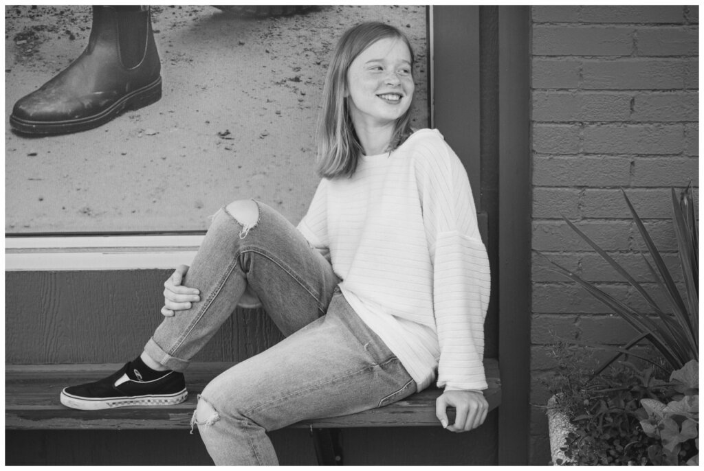 Schoenroth Family - Cathedral Village Regina - 12 - Daughter poses in her Vans shoes