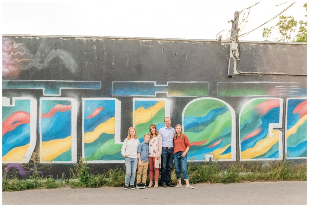 Schoenroth Family - Cathedral Village Regina - 14 - Family stands together in the alley