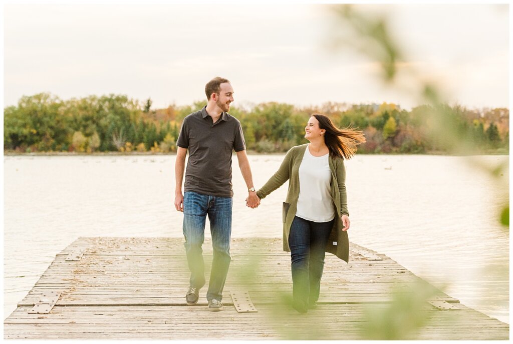 Andrew & Alisha - Engagement Session - 03 - Wascana Boathouse - Couple walking on dock