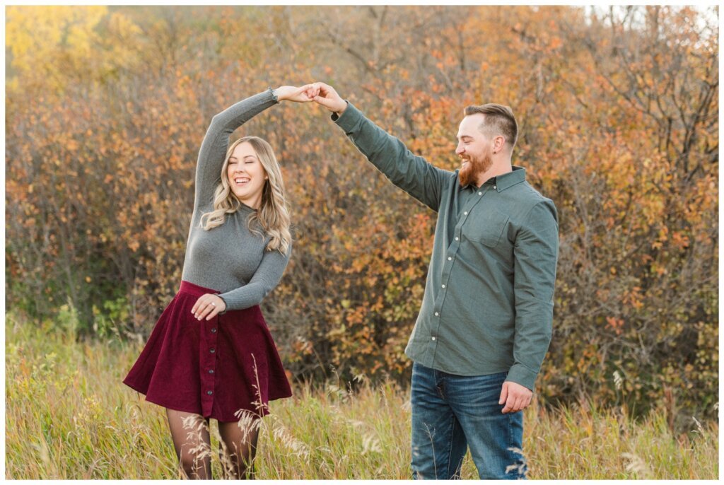 Jared & Jenna - Wascana Trails - 05 - Man spinning fiance in a dance