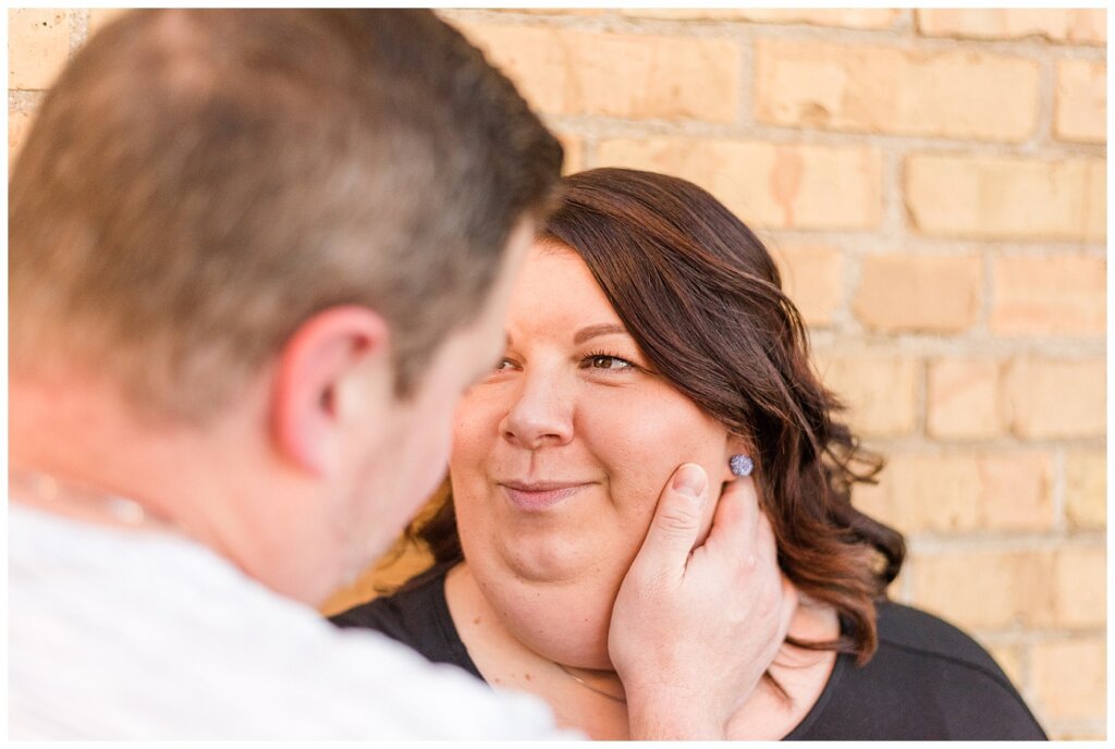 Regina Couples Photo Session - Scott & Ashley 2021 - Regina Warehouse District - 03 - Wife staring longingly at husband