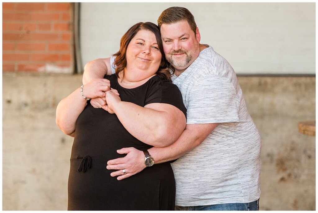 Regina Couples Photo Session - Scott & Ashley 2021 - Regina Warehouse District - 06 - Couple's Portrait near Local Market docks